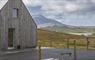 Hebrides House side of house with mountain views