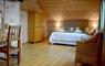 Finsbay Lodges bedroom with seating