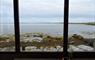 Struan Cottage window looking out to sea