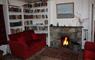 Borve Lodge Estate Self Catering Properties lounge with open fire