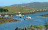 Hebridean-ebikes loch with small boats