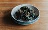 Hebridean mussels in a bowl on a wooden table.