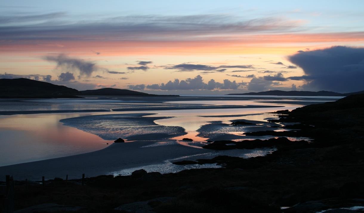 Looking out to Taransay at sunset Looking out to Taransay at sunset